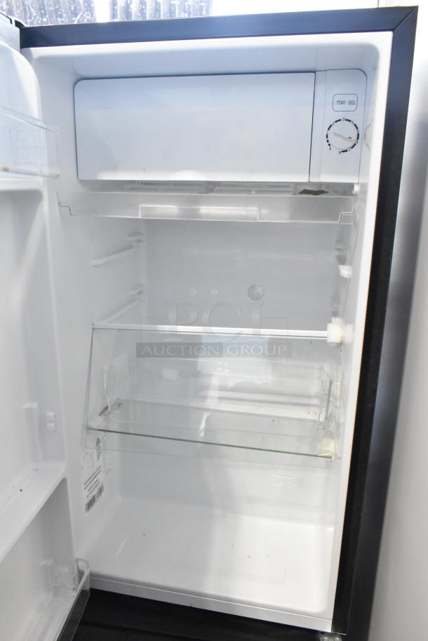 2020 Hisense RR33D6ABE mini cooler, pristine condition, interior shelves, temperature dial, 115V, 1 phase.