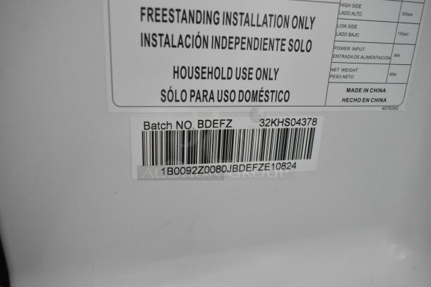 Label on mini cooler showing usage instructions and barcode with batch number BDEFZ. Made in China.