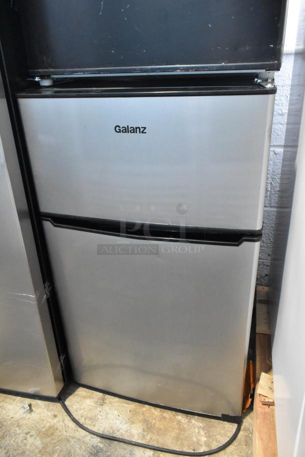 Galanz GLR31TS1E02 mini cooler with freezer, stainless steel finish, good condition, 115V, dual door design.
