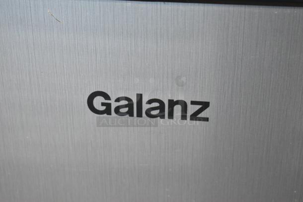 Galanz mini cooler with freezer, model GLR31TS1E02, brand logo visible, part of a set with 2020 Hisense RR33D6ABE.