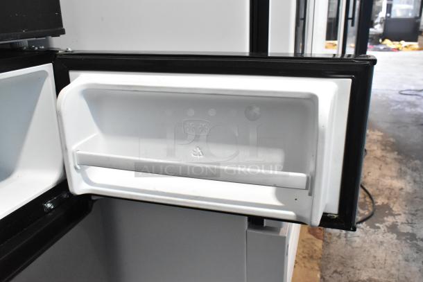 2020 Hisense RR33D6ABE mini cooler door interior, white plastic with ice symbols, part of auction set with Galanz mini cooler.