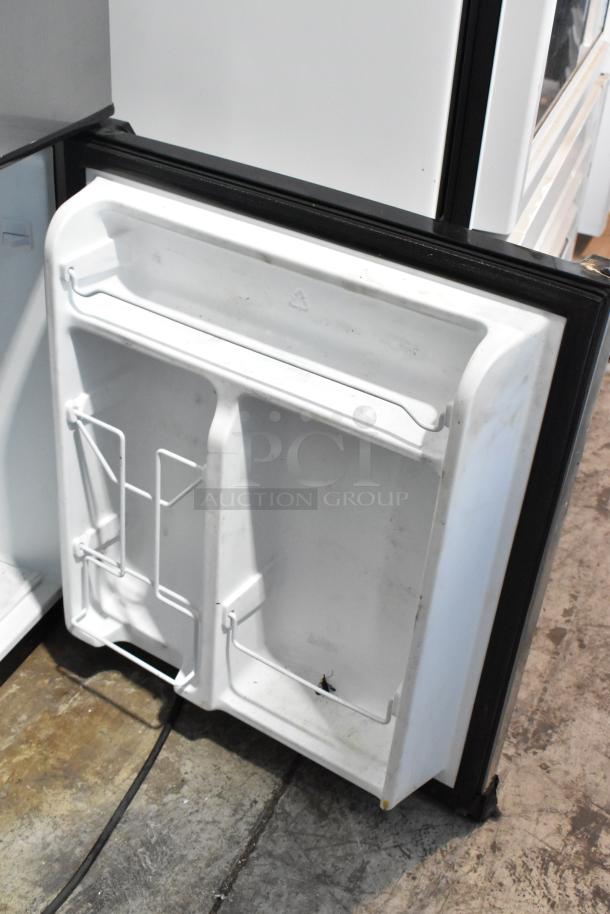 2020 Hisense RR33D6ABE and Galanz GLR31TS1E02 mini coolers; 115V, 1 phase. Visible interior door compartments, used condition.