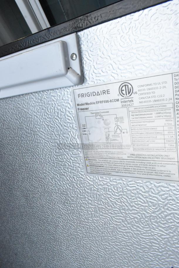 Frigidaire EFRF698-6COM metal single door reach-in freezer, visible model/serial label, 115 volts, 1 phase.