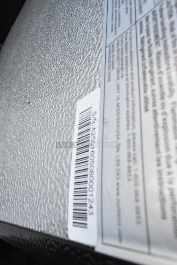 Frigidaire EFRF698-6COM metal freezer label and barcode visible, showcasing serial number A2501605080001243.