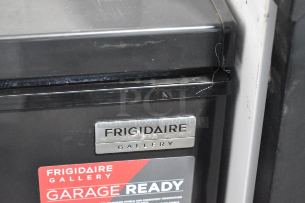 Frigidaire FGFRF7009-B Black Metal Chest Freezer, 115 Volts, 1 Phase, "Garage Ready" label visible.