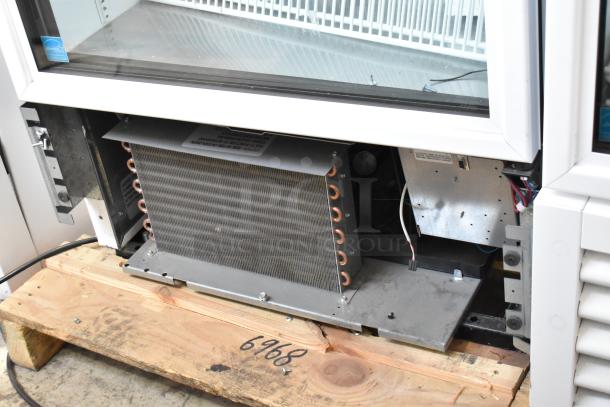 2021 True TSCI-600R-G-PH cooler, metal, single door, with poly-coated racks, 115V, 1 phase, condition shown.