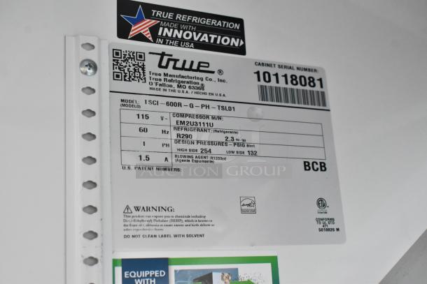 2021 True TSCI-600R-G-PH commercial single door cooler tag; 115V, 1 Phase, R290 refrigerant, poly coated racks.
