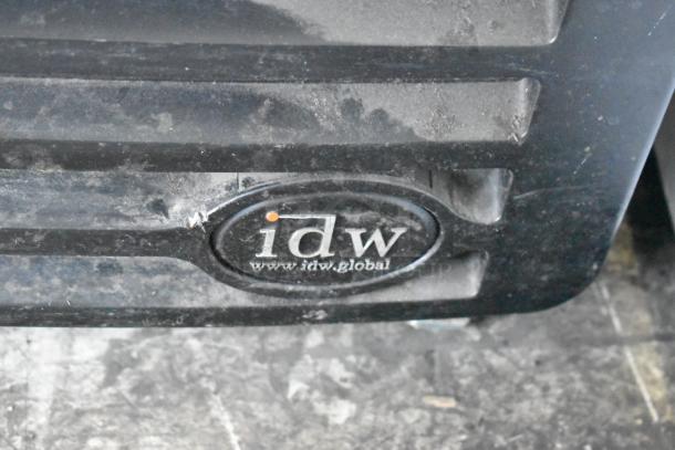 IDW G-10-F334B-HC metal commercial cooler, single door, reach-in design, poly coated racks. Visible IDW logo. 115 volts, 1 phase.