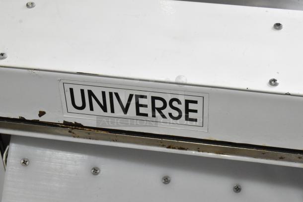 Universe TM18 Metal Commercial Countertop Dough Sheeter, 115V, 1 Phase. Visible wear and scratches on exterior.