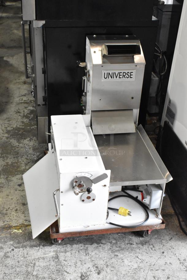 Universe TM18 metal commercial countertop dough sheeter, 115 volts, 1 phase. Silver and white finish, used condition.