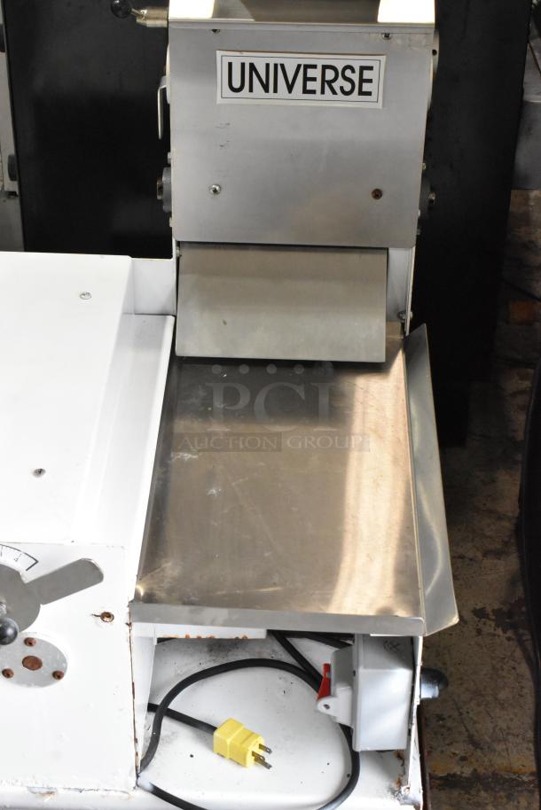 Universe TM18 Metal Commercial Countertop Dough Sheeter, 115 volts, 1 phase, stainless steel surface, brand label visible.