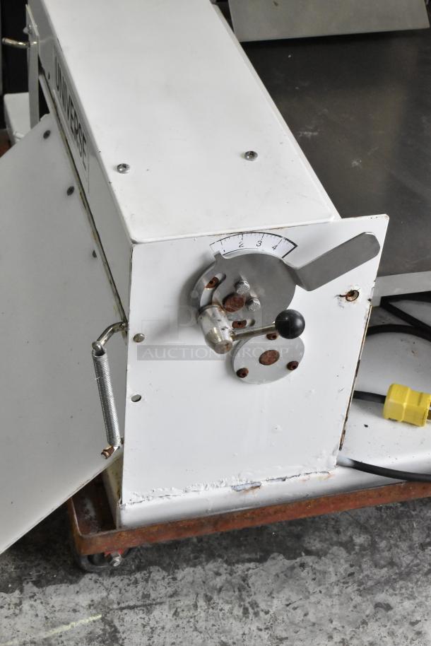 Universe TM18 metal commercial countertop dough sheeter, 115V, 1 Phase, showing adjustment dial, fair condition, minor rust.