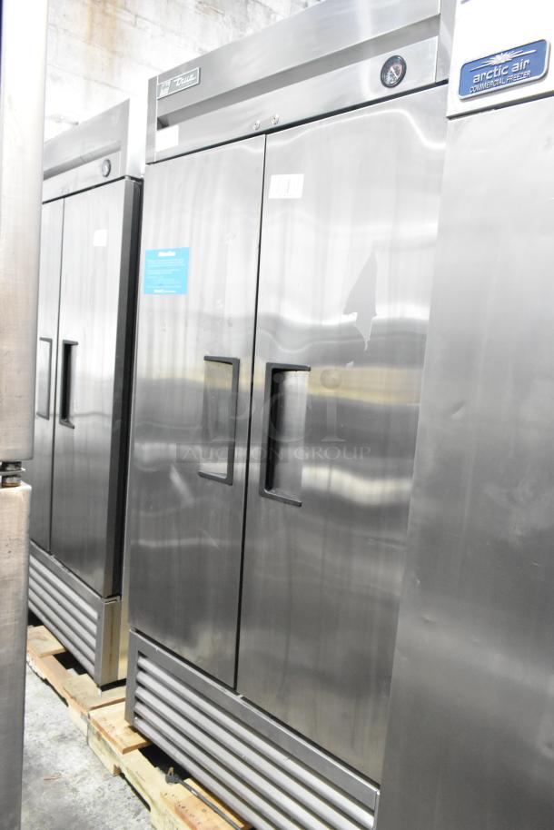 2017 True T-35 stainless steel 2-door commercial cooler, poly-coated racks, casters, 115V, 1 phase, excellent condition.