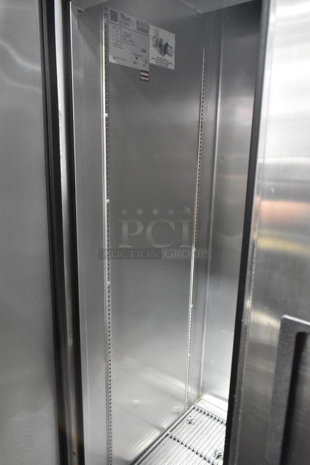 2017 True T-35 stainless steel 2-door reach-in cooler with poly-coated racks, commercial casters, 115V, 1 phase.