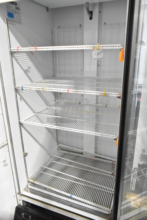 Habco SF28M commercial reach-in freezer with single glass door, poly-coated racks, and 115V, 1-phase power.