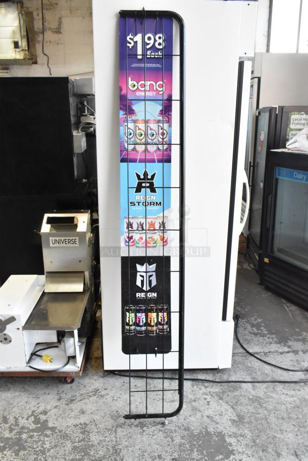 Metal sign frame featuring advertisements for Bang Energy and Reign Storm drinks. Black wired structure, good condition.