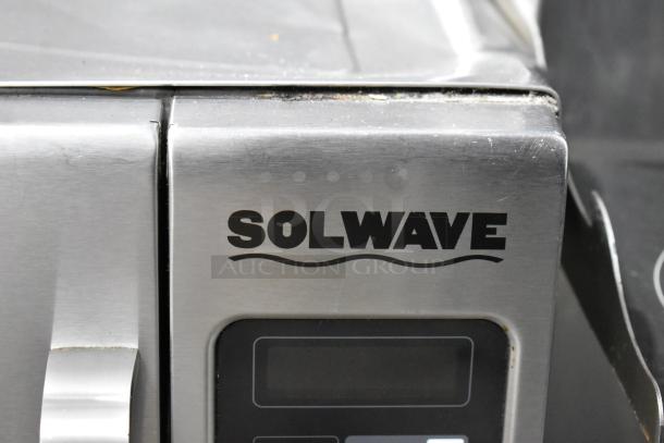 2019 Solwave 180MW120GT stainless steel commercial microwave oven, countertop model. Features control panel, slight wear.
