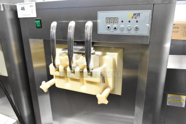 Beiqi BQ333 stainless steel 2-flavor soft serve ice cream machine with twist option, digital controls, on commercial casters.
