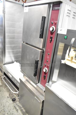 Southbend GSX-10HE stainless steel commercial floor steam cabinet with natural gas power, 2 decks, 190,000 BTU, in good condition.