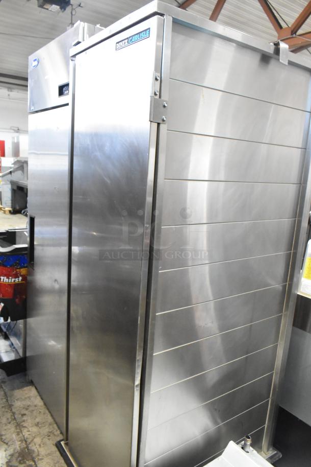 Dinex Carlisle ICTPT-24 metal commercial pan transport rack with enclosed design on heavy-duty casters, excellent condition.