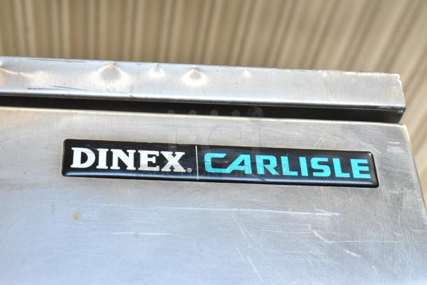 Dinex Carlisle ICTPT-24 metal pan transport rack with commercial casters; features brand logo, durable construction.