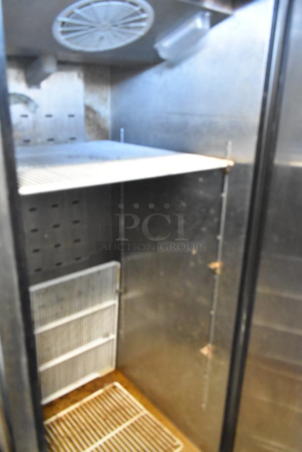 2021 Atosa MBF8001GR stainless steel commercial freezer, single door, with poly-coated racks and commercial casters.