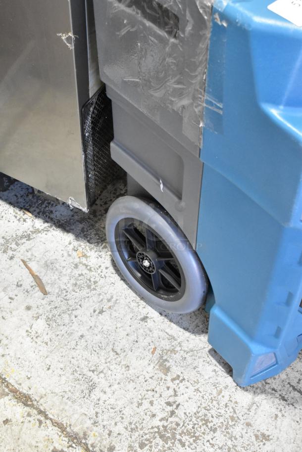 2024 Boltic 22BPCD130P Dehumidifier, 115V, 1 Phase, with sturdy wheels and robust plastic casing, in good condition.