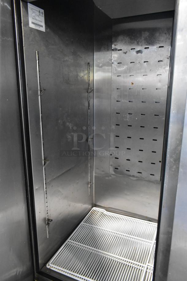 2021 Padela PDB-2F-HC stainless steel commercial freezer interior, featuring poly-coated racks and label.