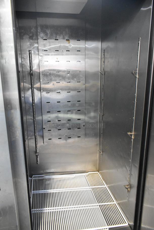 2021 Padela PDB-2F-HC stainless steel commercial 2-door reach-in freezer with poly coated racks, on casters.