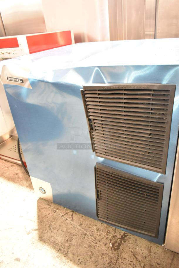 2024 Hoshizaki KM-901MAJ stainless steel ice machine head, 208-230V, 1 phase. Clean condition, vented panels visible.