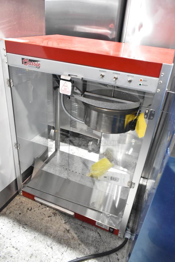 Paragon TP-16 Metal Commercial Countertop Popcorn Machine, model 1116810. Features a red top, glass enclosure, 120 volts, 1 phase.