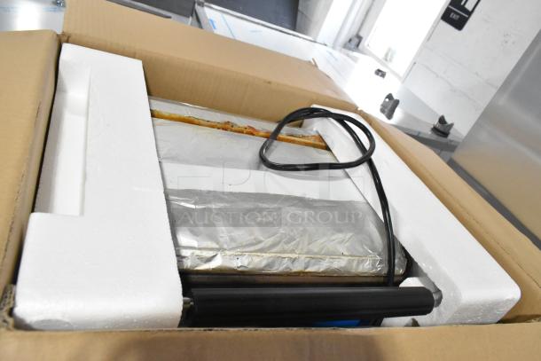Rocket Cooking RC-GH-811EB Stainless Steel Panini Press in original packaging. Suitable for commercial use, 120V, 1 Phase.