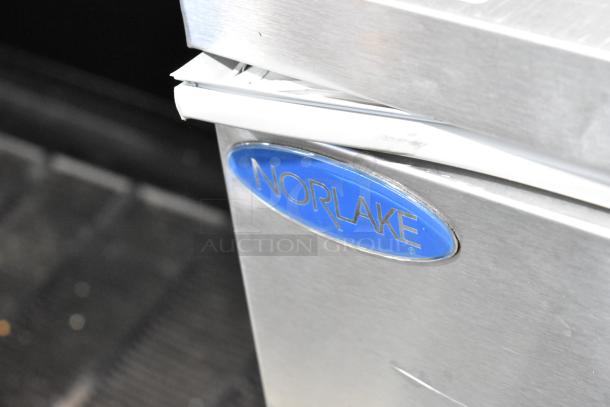 Norlake AR122SSS/0-A stainless steel commercial milk cooler with logo, features casters, 208-230 volts, 1 phase.