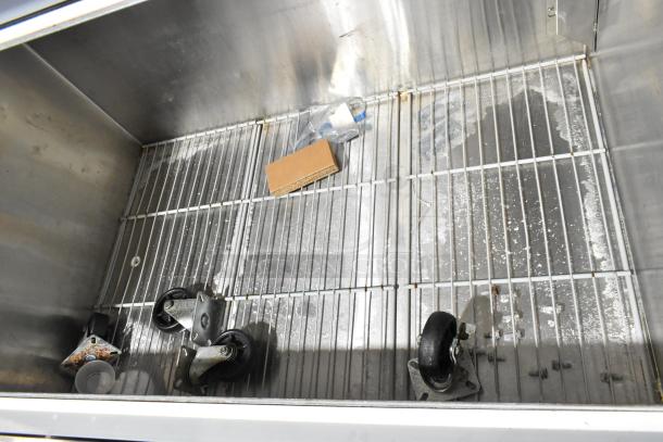 Norlake AR122SSS/0-A stainless steel milk cooler interior, with commercial casters, used condition. 208-230V, 1 Phase.