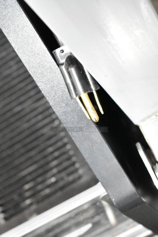 Norlake AR122SSS/0-A stainless steel commercial milk cooler detail, showing wiring component, 208-230 volts, 1 phase.