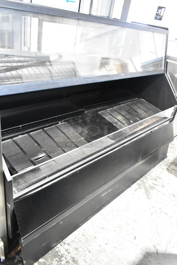 Federal Industries ESSRC7752 black metal air curtain merchandiser with convertible top, commercial use, 208-240V, 1 phase.