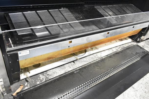 Federal Industries ESSRC7752 metal commercial black air curtain merchandiser with convertible top. 208-240V, 1 Phase, in used condition.