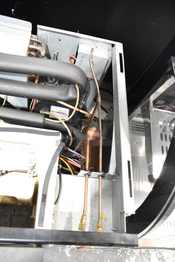Manitowoc SY1204A ice head interior view, showing wiring and components. 208-230V, 1-phase, stainless steel.