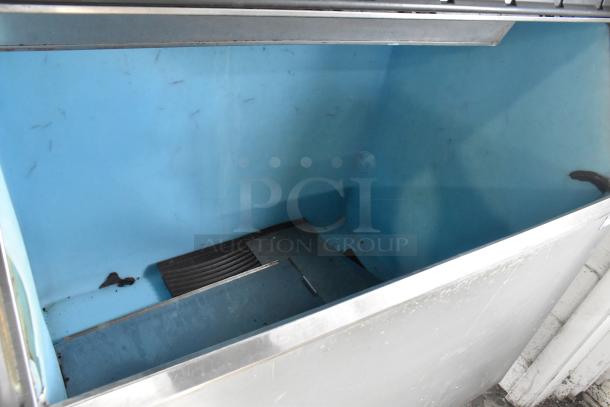 Manitowoc QY1305W commercial ice head, metal bin, 208-230 volts, 1 phase. Clean interior, some wear.