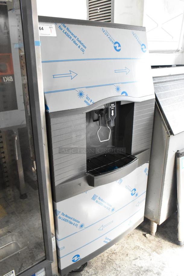 2024 Manitowoc SPA312-161 stainless steel ice dispenser, touchless, 30", 180 lb capacity, scratch and dent, new condition.