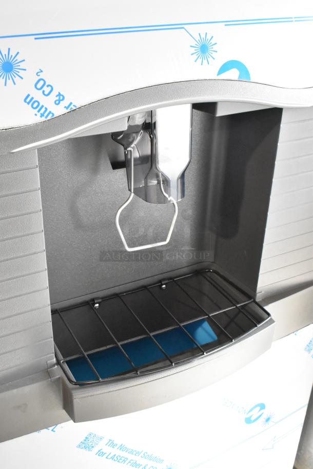 2024 Manitowoc SPA312-161 stainless steel touchless hotel ice dispenser, 30", new with slight dents, 115V, 180 lb. capacity.
