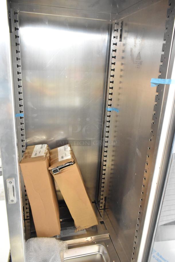 Brand new Metro C519-PFC-U stainless steel proofing cabinet with visible scratches. Includes packaging and components. 120V, 1 Phase.