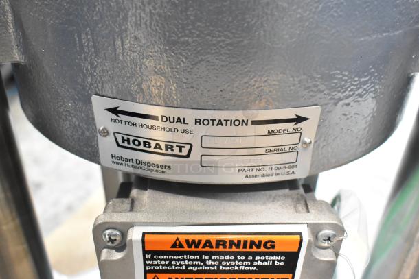 BRAND NEW, Hobart FD4/150-1 Commercial Garbage Disposer, 1 1/2 hp, 208-230/460V, with dual rotation and warning label.