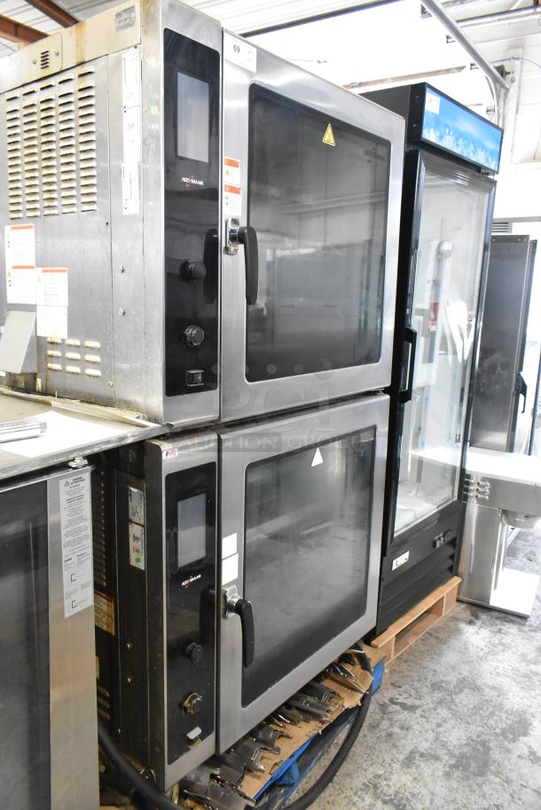 2 Alto Shaam AR-7T rotisserie ovens with 7 spits, stainless steel, 208V, 1 phase, shown in commercial setting.
