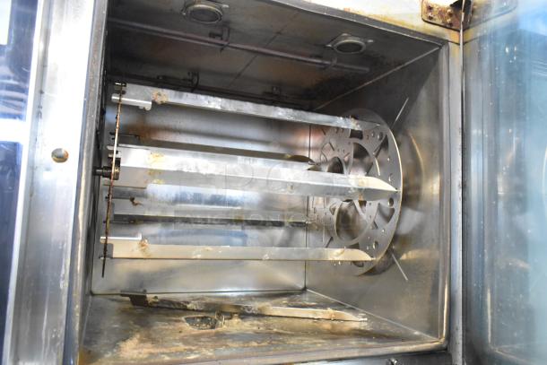 Alto Shaam AR-7T stainless steel rotisserie oven interior, 7 spits, self-cleaning, commercial use, 208V, 1 phase.