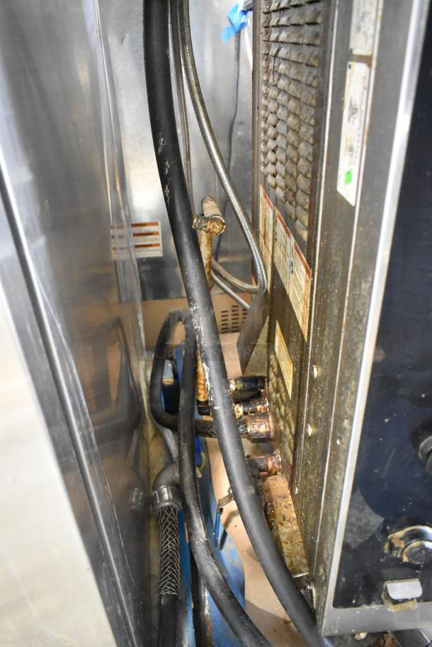 2020 Alto Shaam AR-7T electric rotisserie oven, stainless steel, 7 spits, 208V, 1 phase, commercial use, self-cleaning.