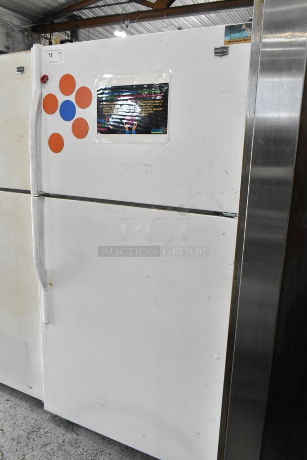 Maytag M1TXEGMYW00 cooler with freezer. White metal, visible wear. 115 volts, 1 phase. Stickers and labels on door.
