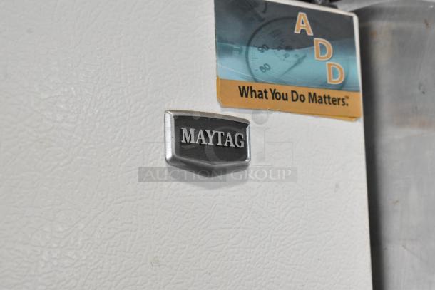 Maytag M1TXEGMYW00 metal reach-in cooler with freezer, 115 volts, 1 phase, features a textured white exterior with a visible Maytag logo.