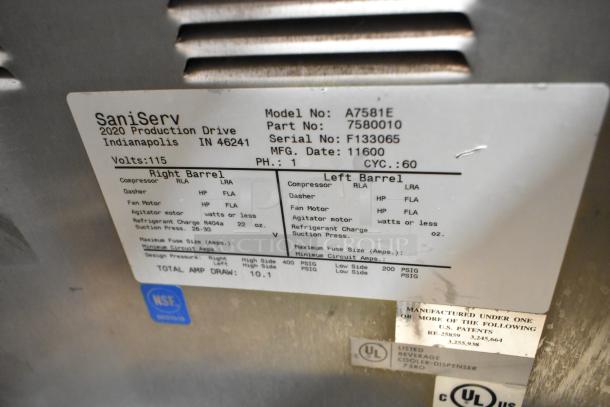 SaniServ A7581E stainless steel frozen beverage machine, 2 flavors, 115 volts, model details and specs on visible label.