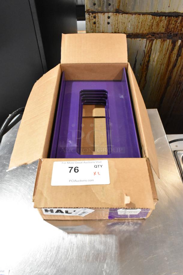 Two boxes of Purple Pan Stackers in open cardboard packaging with auction label "76 QTY 2 XL" visible.